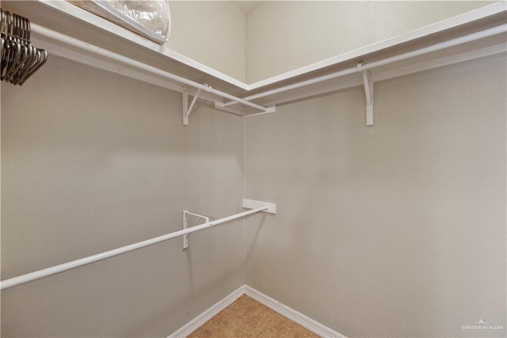 2715 Mimosa Street, Unit 9 Mission, TX 78574 - Photo 14 of 21 a view of a room with racks on the wall