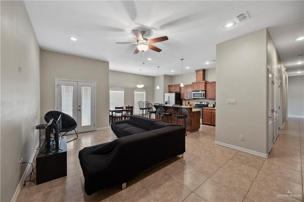 2715 Mimosa Street, Unit 9 Mission, TX 78574 - Photo 4 of 21 a living room with furniture and kitchen view
