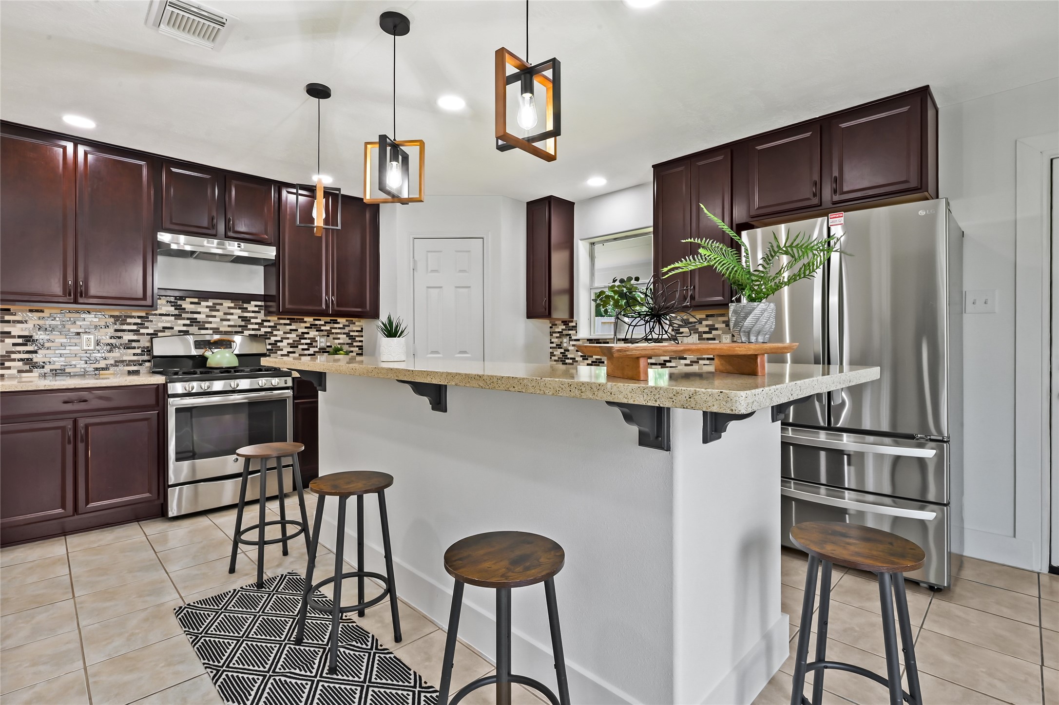 23311 Leafstone Lane Spring, TX 77373 - Photo 9 of 35 Breakfast bar perfect for casual dining and entertaining.
