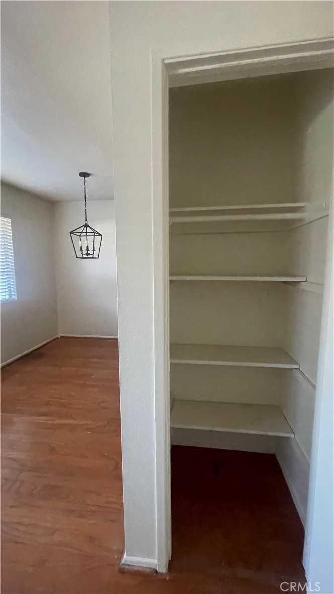 2560 Gonzaga Lane Riverside, CA 92507 - Photo 31 of 52 a view of walk in closet with empty racks