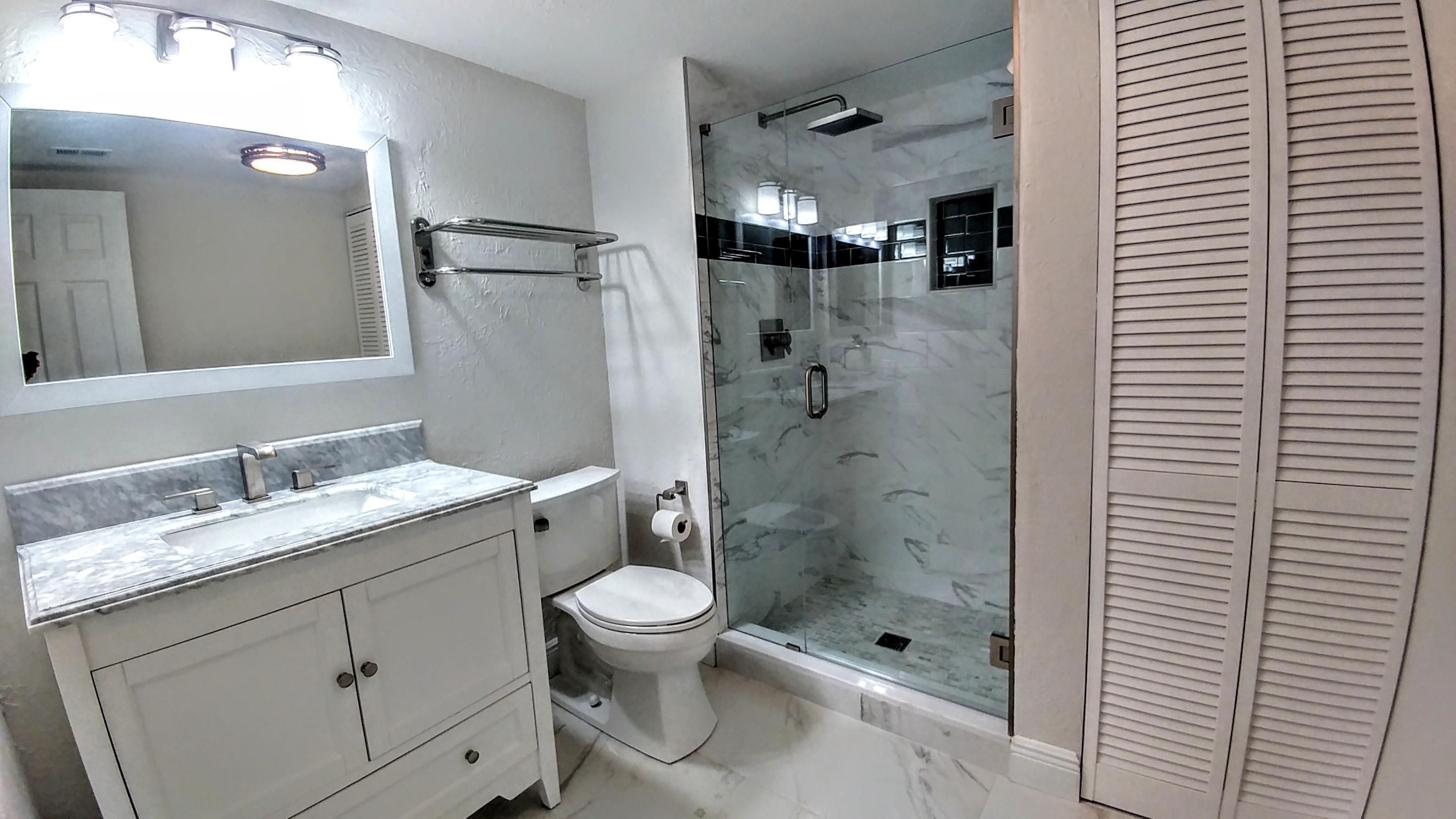 21675 Tall Palm Circle, Unit 2D Boca Raton, FL 33433 - Photo 38 of 41 Guest Bath