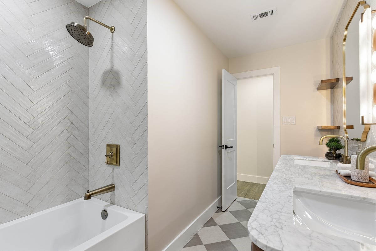 12510 Deep Spring Lane Houston, TX 77077 - Photo 18 of 37 Take a bath in style! Elegant designer tile extends to the ceiling!