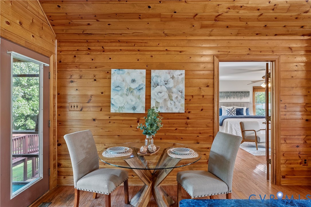 949 Old Buckingham Road Cumberland, VA 23040 - Photo 18 of 49 a dining room with furniture and wooden floor