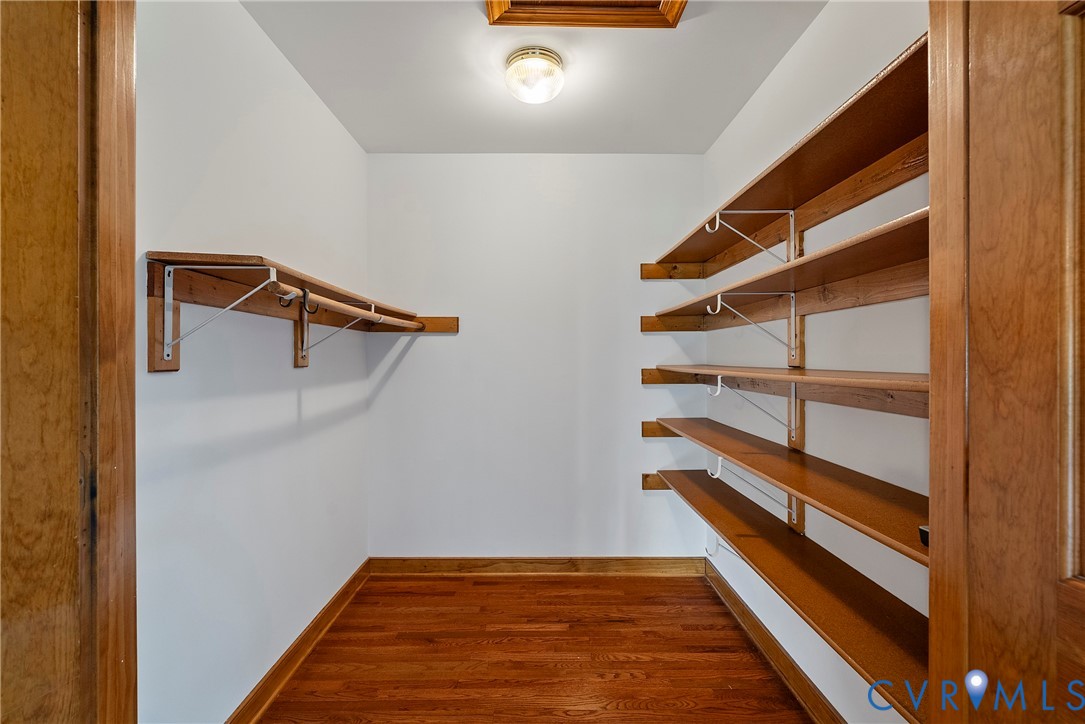 949 Old Buckingham Road Cumberland, VA 23040 - Photo 26 of 49 Bedroom featuring light wood-style floors and a ce
