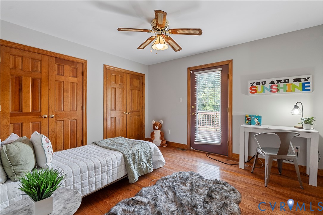 949 Old Buckingham Road Cumberland, VA 23040 - Photo 28 of 49 Bedroom with wood-type flooring and ceiling fan