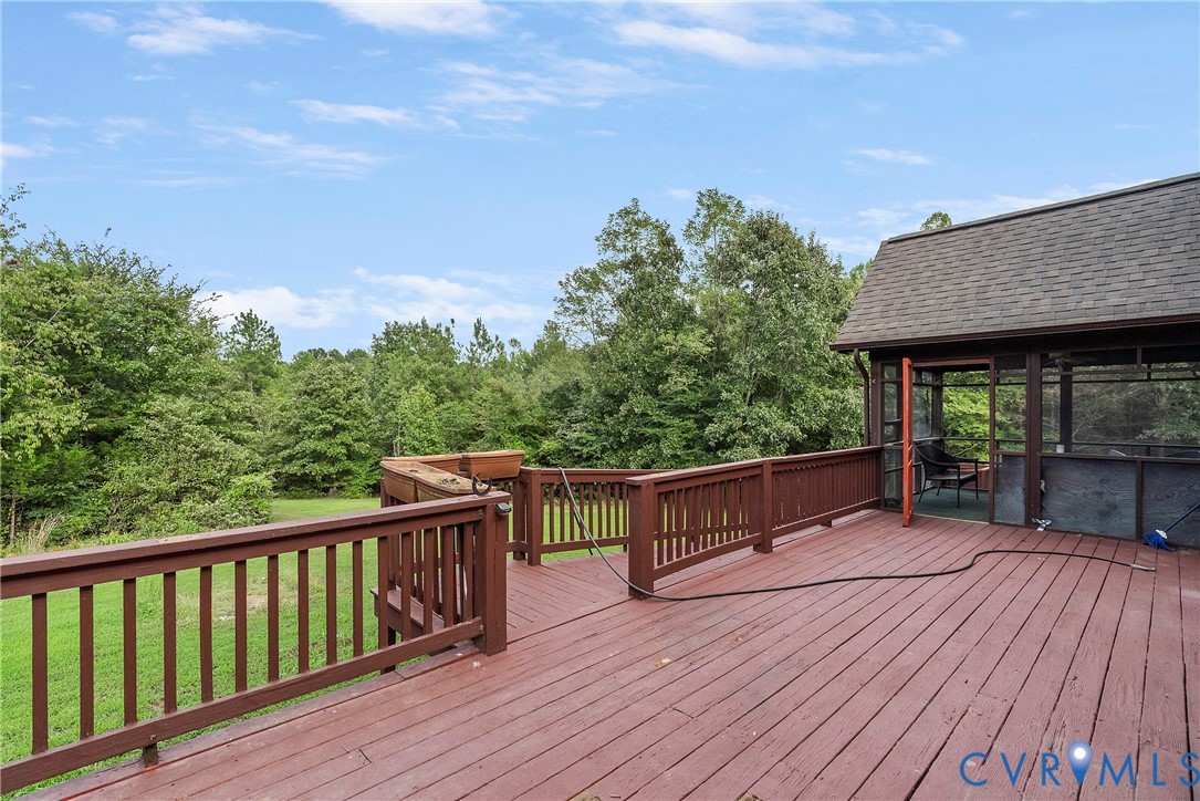 949 Old Buckingham Road Cumberland, VA 23040 - Photo 33 of 49 Deck, full length of the house.