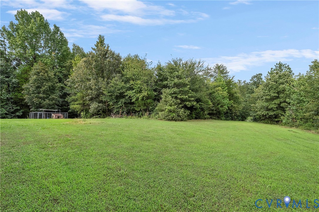 949 Old Buckingham Road Cumberland, VA 23040 - Photo 38 of 49 Meadow with a hunting blind; great spot to be down