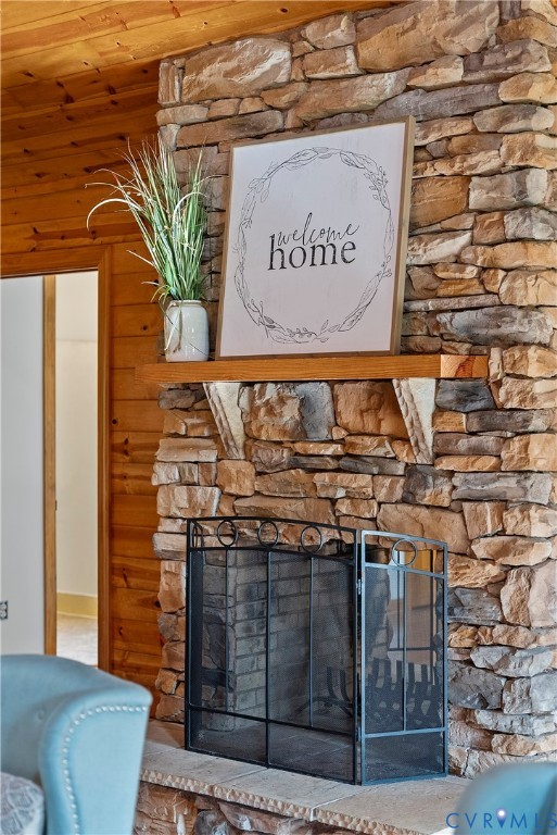949 Old Buckingham Road Cumberland, VA 23040 - Photo 7 of 49 Living area with high vaulted ceiling, wooden wall