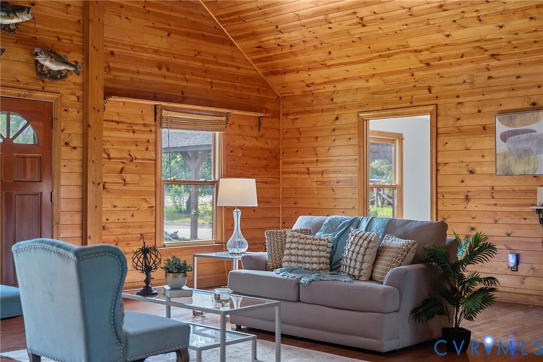 949 Old Buckingham Road Cumberland, VA 23040 - Photo 10 of 49 a balcony with furniture and a potted plant