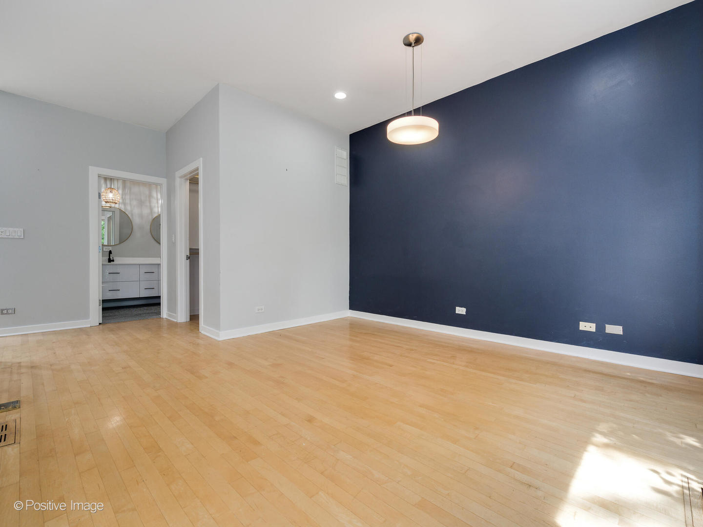 1834 West Rice Street, Unit A Chicago, IL 60622 - Photo 11 of 23 a view of an empty room with a window