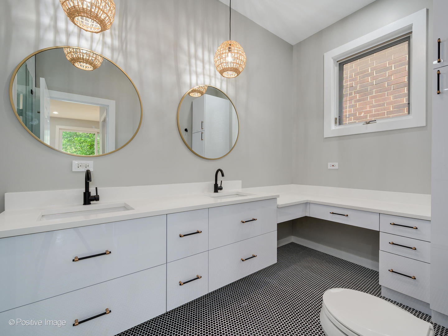 1834 West Rice Street, Unit A Chicago, IL 60622 - Photo 12 of 23 a bathroom with a toilet a sink and mirror