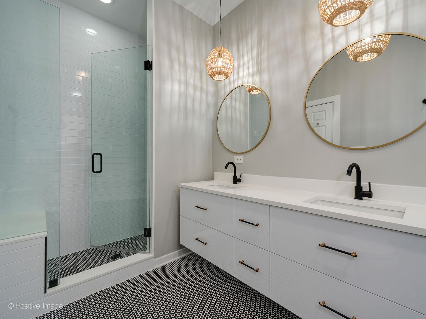 1834 West Rice Street, Unit A Chicago, IL 60622 - Photo 13 of 23 a bathroom with a double vanity sink and a mirror