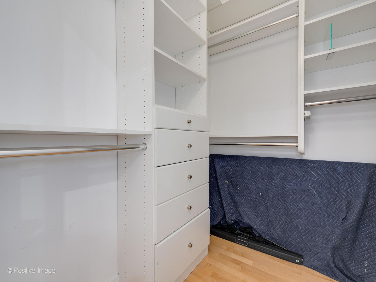1834 West Rice Street, Unit A Chicago, IL 60622 - Photo 14 of 23 a kitchen with white cabinets and white appliances