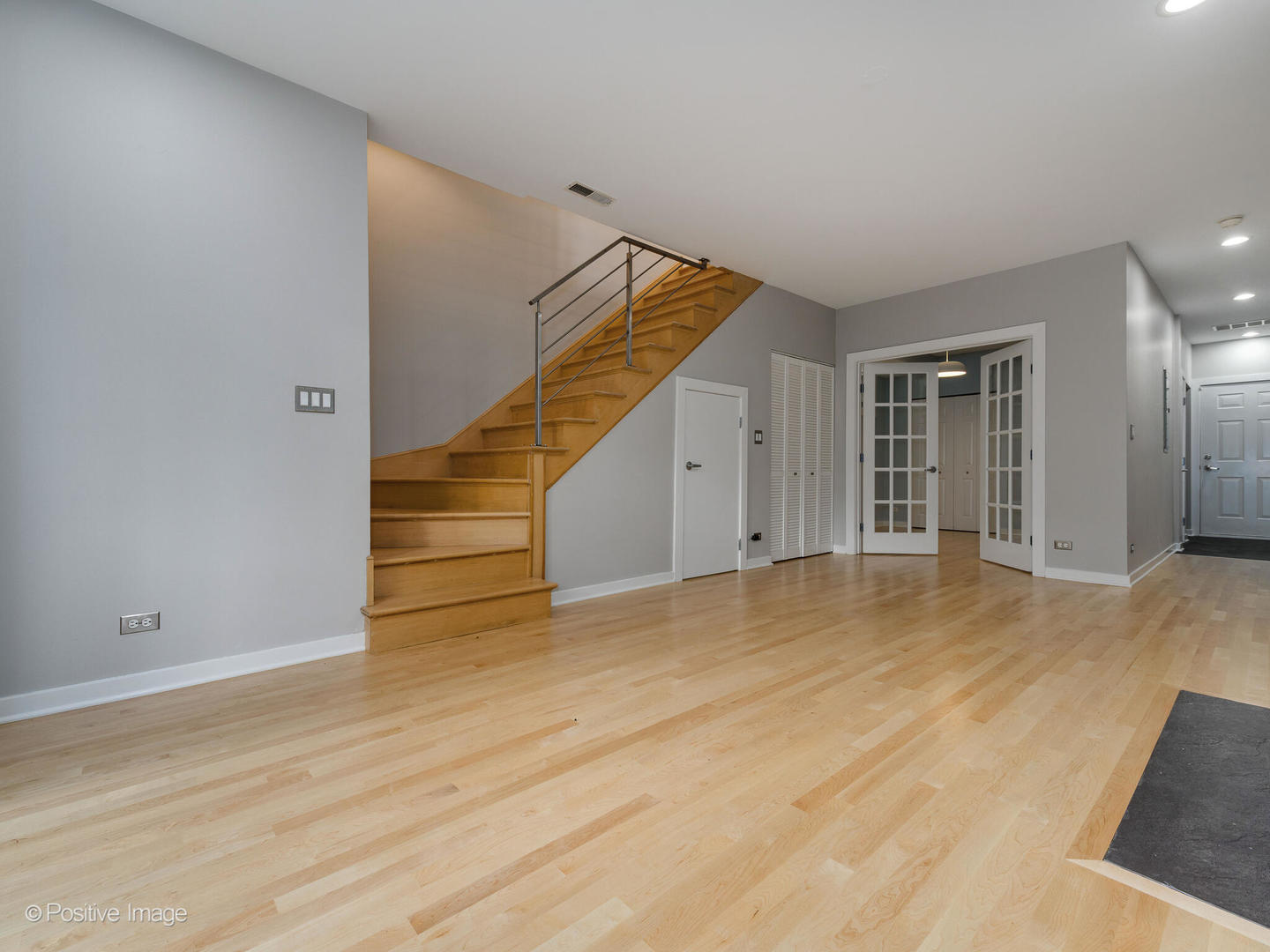 1834 West Rice Street, Unit A Chicago, IL 60622 - Photo 16 of 23 a view of an empty room with wooden floor