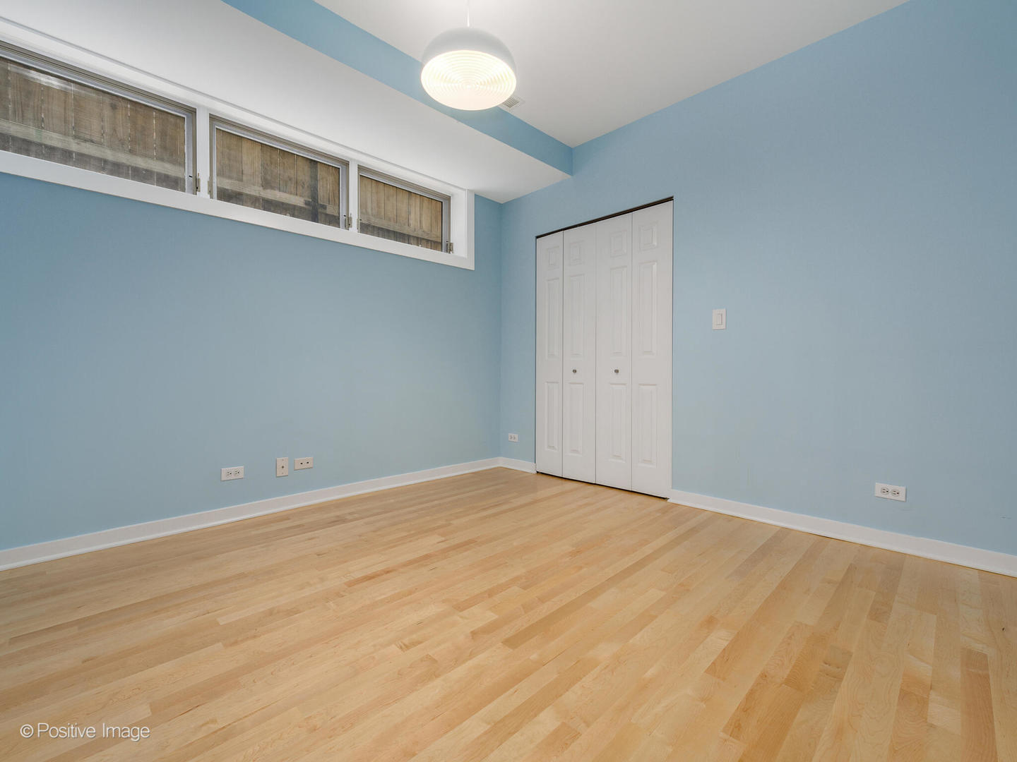 1834 West Rice Street, Unit A Chicago, IL 60622 - Photo 19 of 23 a view of an empty room with a window