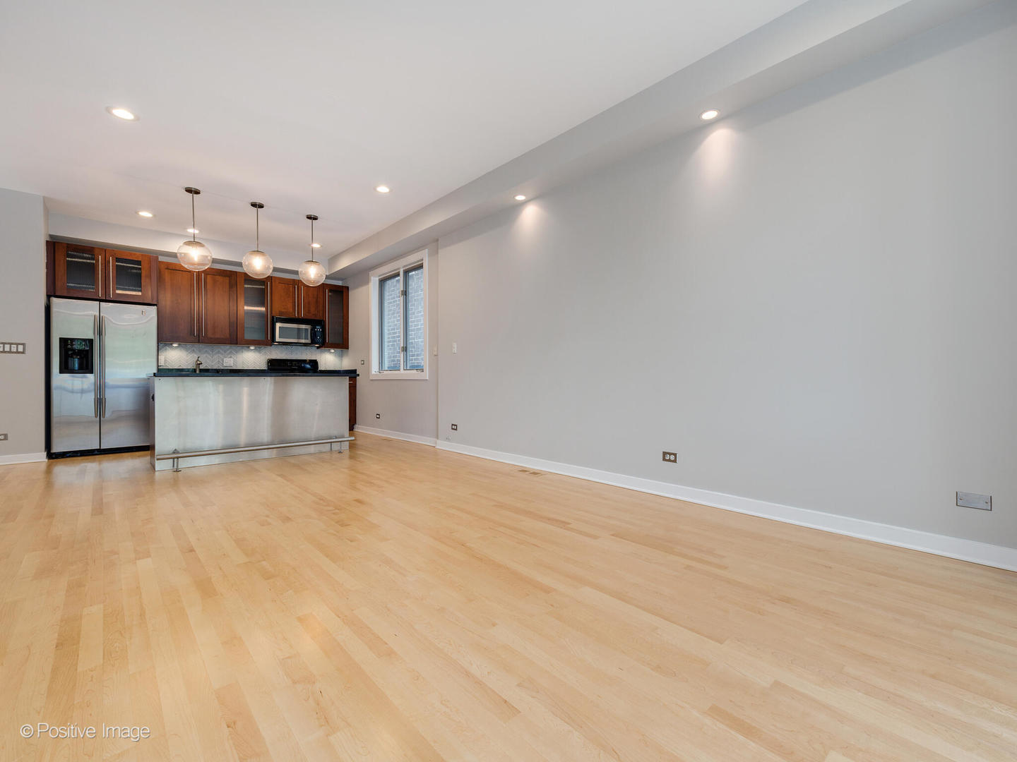 1834 West Rice Street, Unit A Chicago, IL 60622 - Photo 2 of 23 a view of kitchen and kitchen island