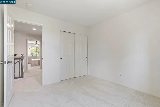 a bathroom with a sink vanity granite and a mirror