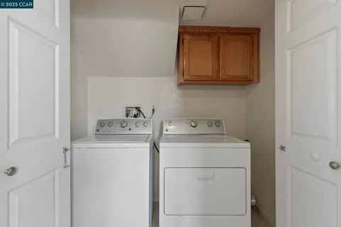 a view of a chair and table in the patio