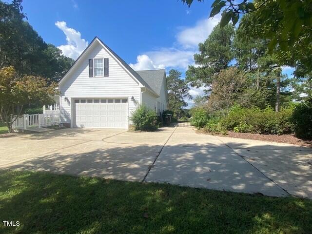 1009 Portico Place Raleigh, NC 27603 - Photo 46 of 54 right side yard 1