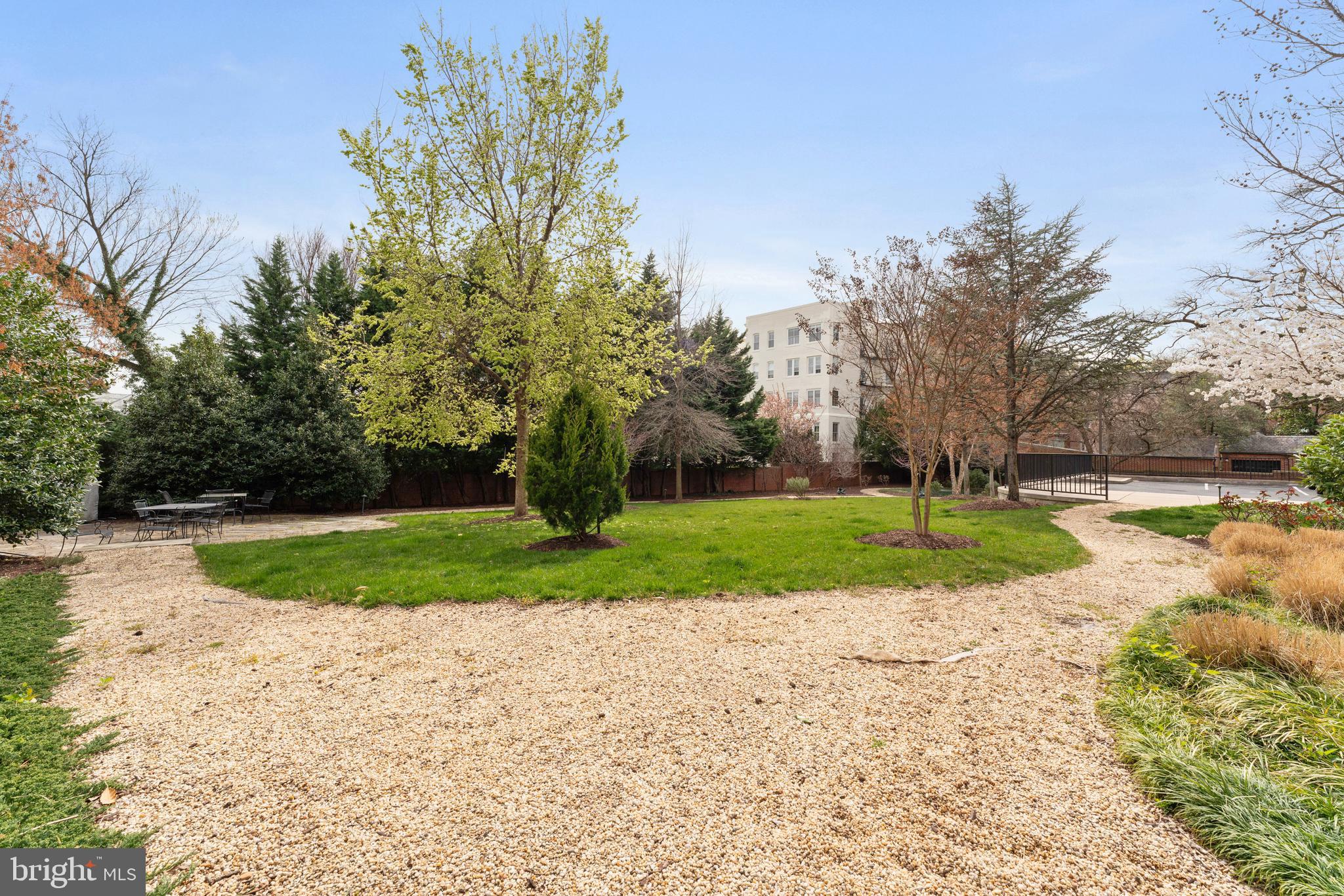 3052 R Street Northwest, Unit 307 Washington, DC 20007 - Photo 42 of 66 Pebble Walkway Leads to Private Serene Spaces