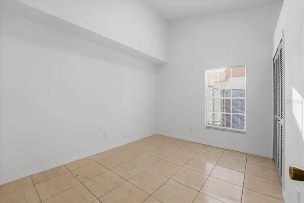an empty room with windows