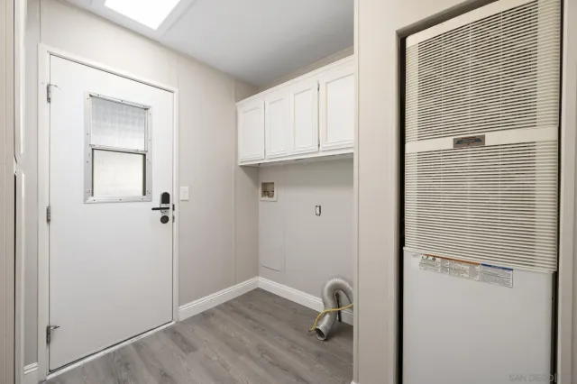 a view of a livingroom with wooden floor