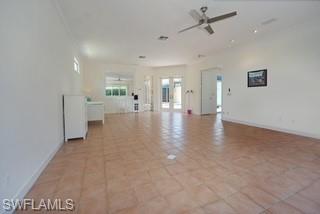 922 Turtle Court Naples, FL 34108 - Photo 15 of 29 a view of an empty room with a window