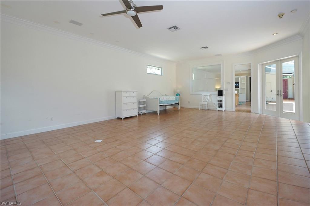 922 Turtle Court Naples, FL 34108 - Photo 17 of 29 a living room with furniture