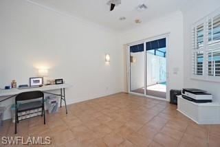 922 Turtle Court Naples, FL 34108 - Photo 23 of 29 a view of workspace with furniture and window