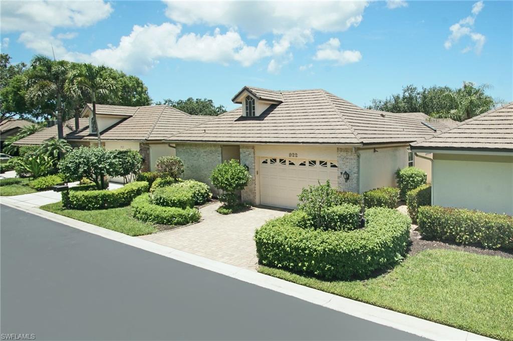 922 Turtle Court Naples, FL 34108 - Photo 27 of 29 an aerial view of a house with yard and green space