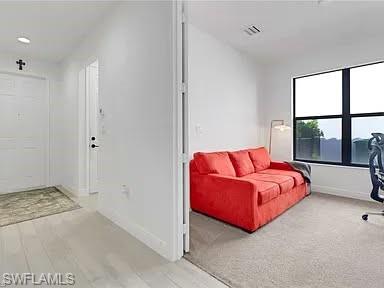 9011 Madrid Circle Naples, FL 34104 - Photo 2 of 20 a spacious bedroom with a bed and glass window
