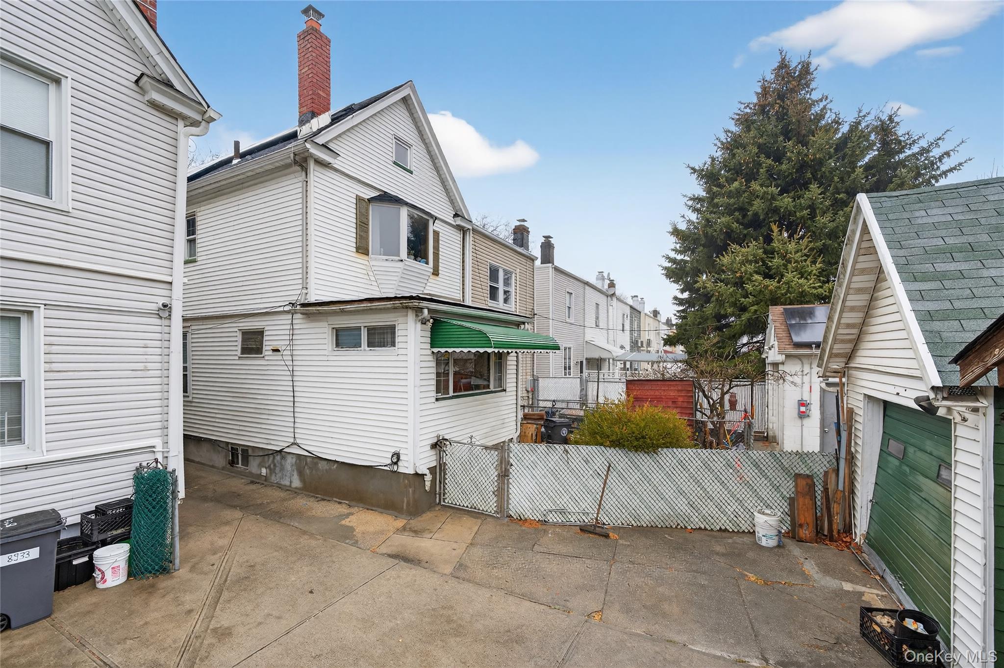 89-31 85th Street Queens, NY 11421 - Photo 37 of 42 backyard/driveway/ garage