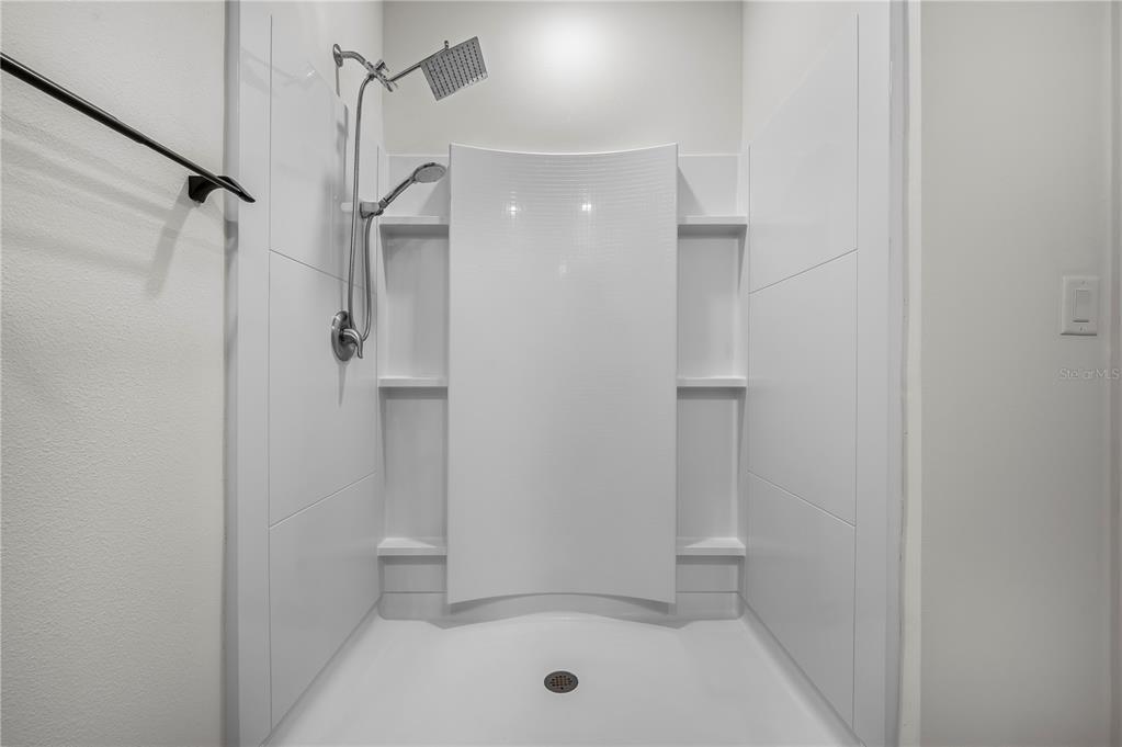 114 Birch Tree Place Daytona Beach, FL 32117 - Photo 20 of 33 a bathroom with a shower