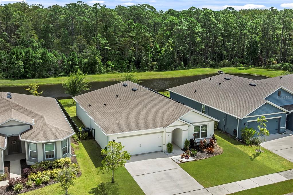 114 Birch Tree Place Daytona Beach, FL 32117 - Photo 30 of 33 an aerial view of a house with a yard table and chairs