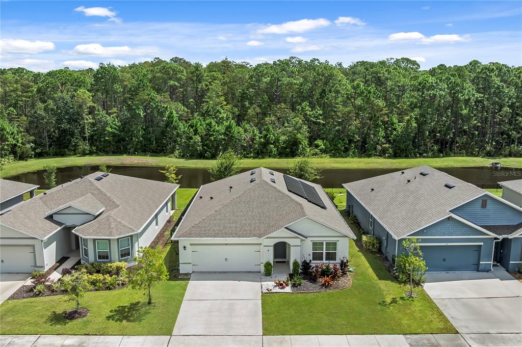 114 Birch Tree Place Daytona Beach, FL 32117 - Photo 3 of 33 an aerial view of a house with a garden
