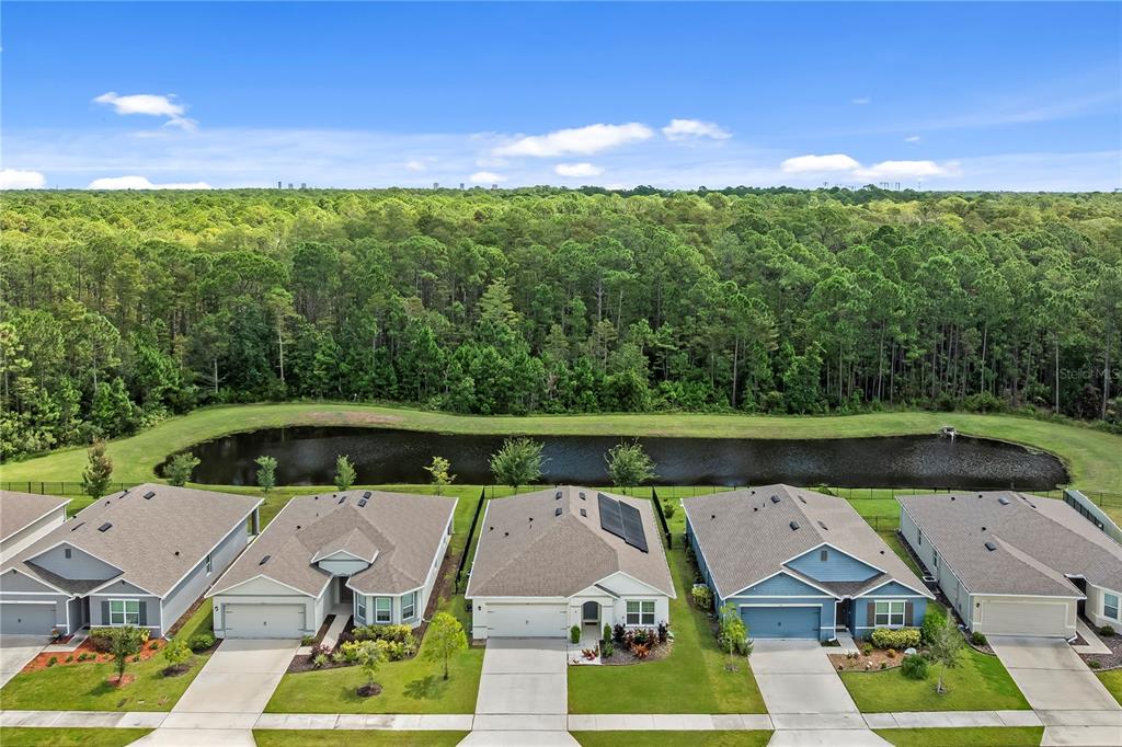 114 Birch Tree Place Daytona Beach, FL 32117 - Photo 31 of 33 a view of house with yard swimming pool and outdoor seating