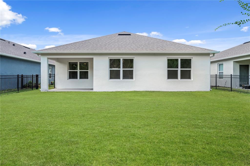 114 Birch Tree Place Daytona Beach, FL 32117 - Photo 5 of 33 a front view of house with yard and green space