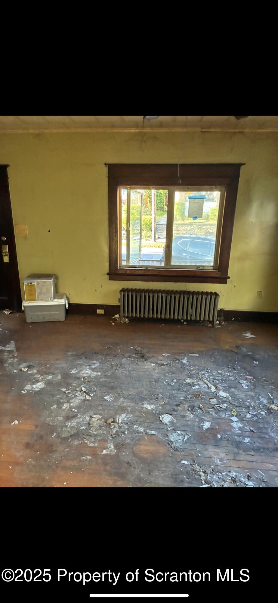 2136 North Main Avenue Scranton, PA 18508 - Photo 6 of 18 a view of an empty room with a window