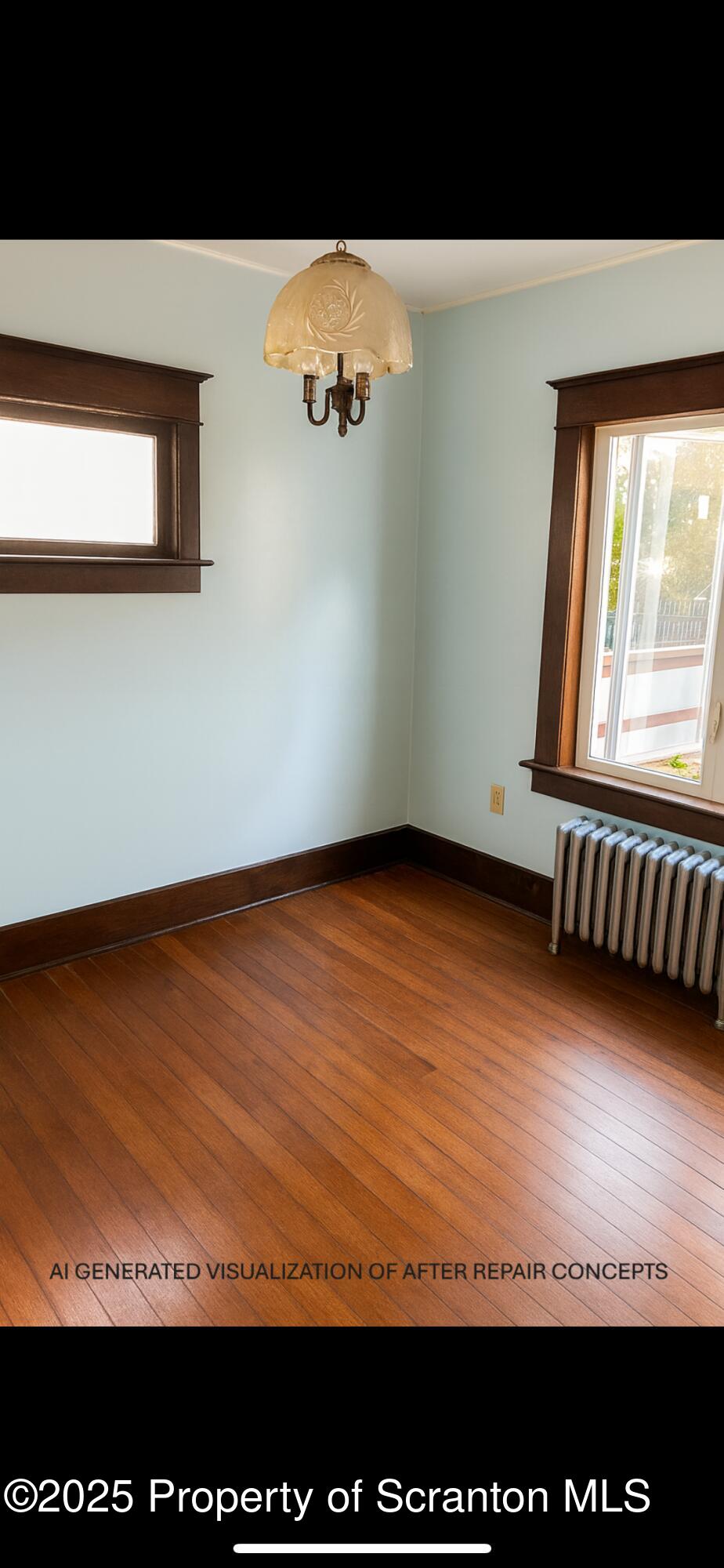 2136 North Main Avenue Scranton, PA 18508 - Photo 9 of 18 a view of an empty room with wooden floor and a window