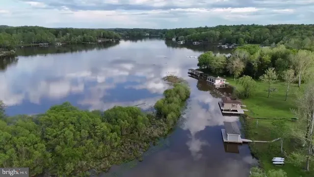 a view of a house with backyard porch and patio