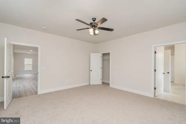 a bathroom with a tub and shower