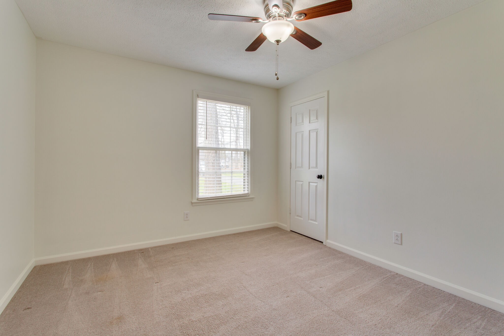 416 Karstridge Road Smyrna, TN 37167 - Photo 22 of 25 an empty room with a window and a fan