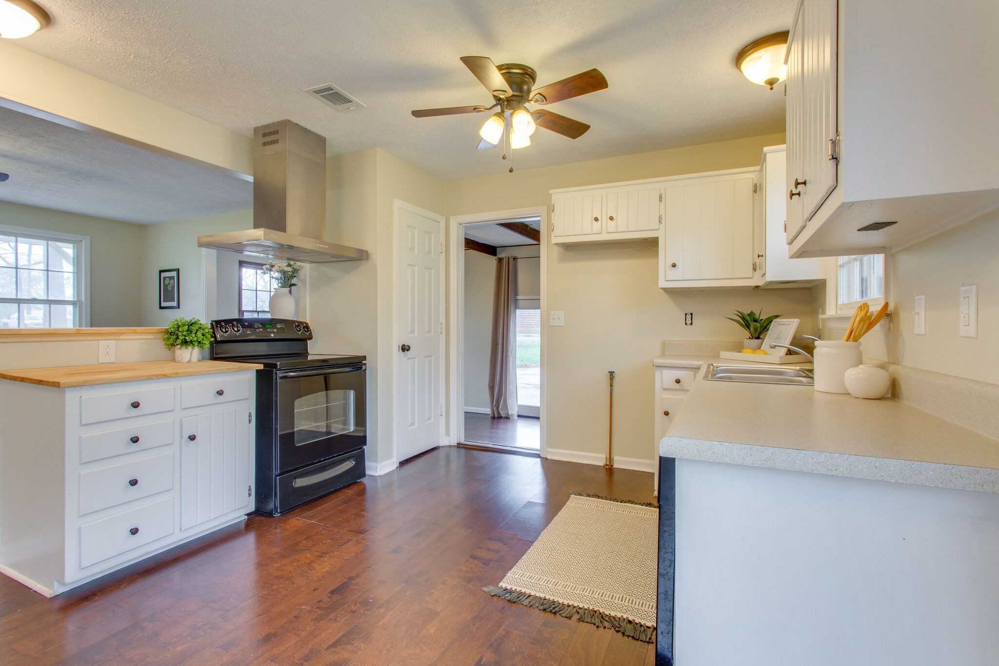 416 Karstridge Road Smyrna, TN 37167 - Photo 10 of 25 a kitchen with cabinets and wooden floor