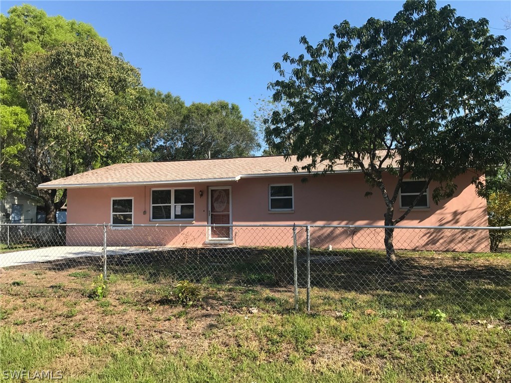 12631 Fourth Street Fort Myers, FL 33905 - Photo 1 of 16 a view of a house with a yard