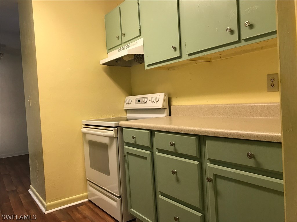 12631 Fourth Street Fort Myers, FL 33905 - Photo 4 of 16 a view of a storage and utility room with washer and dryer