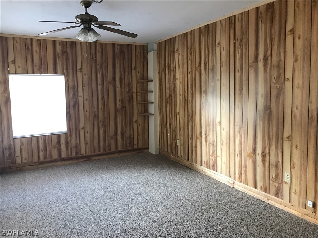 12631 Fourth Street Fort Myers, FL 33905 - Photo 6 of 16 a view of a room with a window and a ceiling fan
