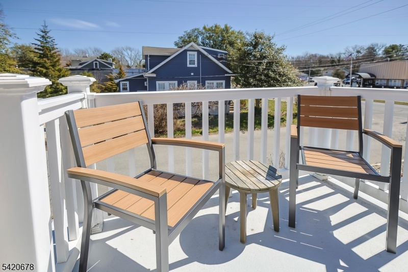 246 Mantoloking Road, Unit 3 Brick, NJ 08723 - Photo 11 of 12 a view of a balcony with chairs