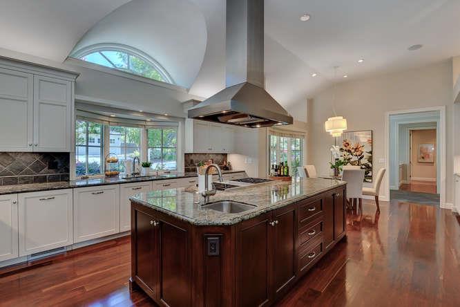 2324 Crest Lane Menlo Park, CA 94025 - Photo 14 of 42 a kitchen with stainless steel appliances granite countertop a sink a stove and a wooden floors