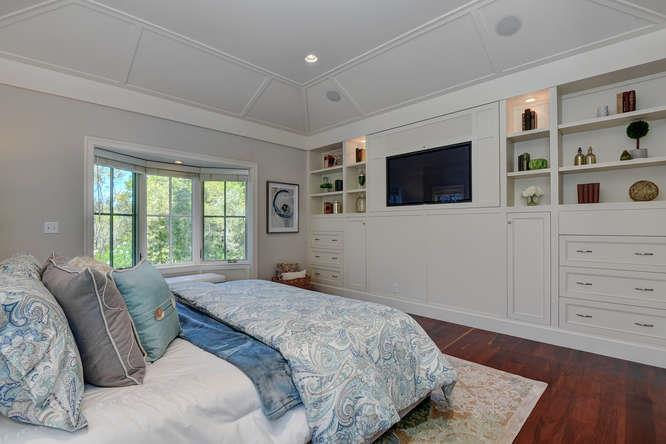 2324 Crest Lane Menlo Park, CA 94025 - Photo 21 of 42 a bedroom with a large bed and a flat tv screen on dresser