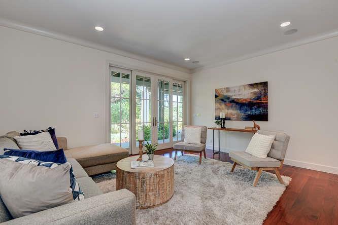 2324 Crest Lane Menlo Park, CA 94025 - Photo 24 of 42 a living room with furniture and a flat screen tv